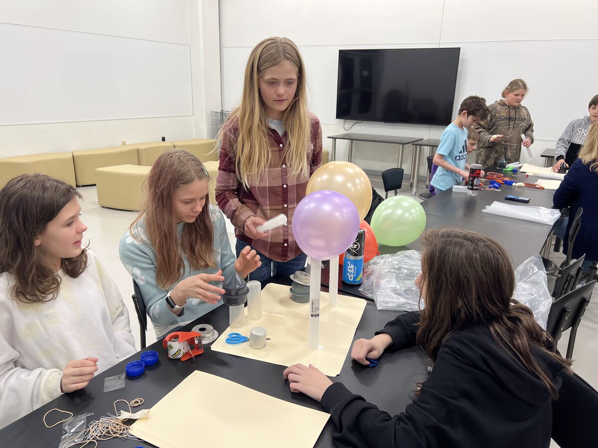 Students engage in balloon lesson at the Cincinnati Museum Center